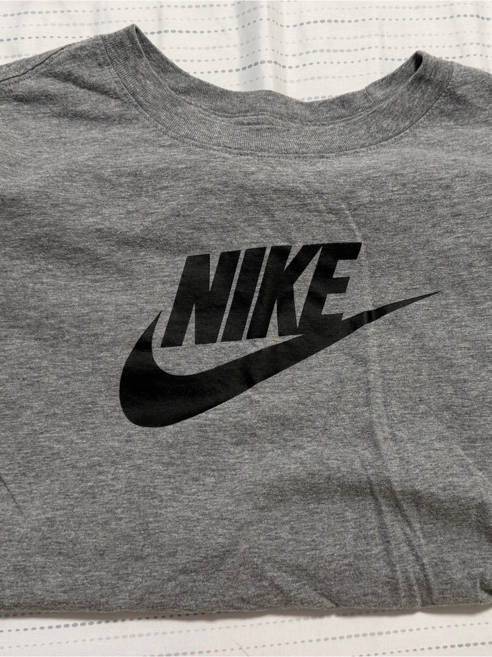 Grey Nike shirt